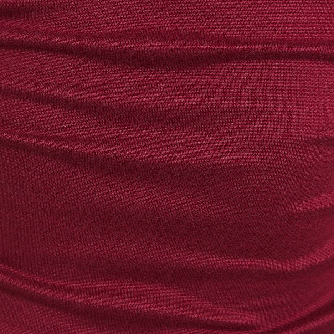 Close-up of maroon fabric with visible texture