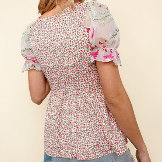 Back view of spring knit top with ruched front and soft stretch fabric