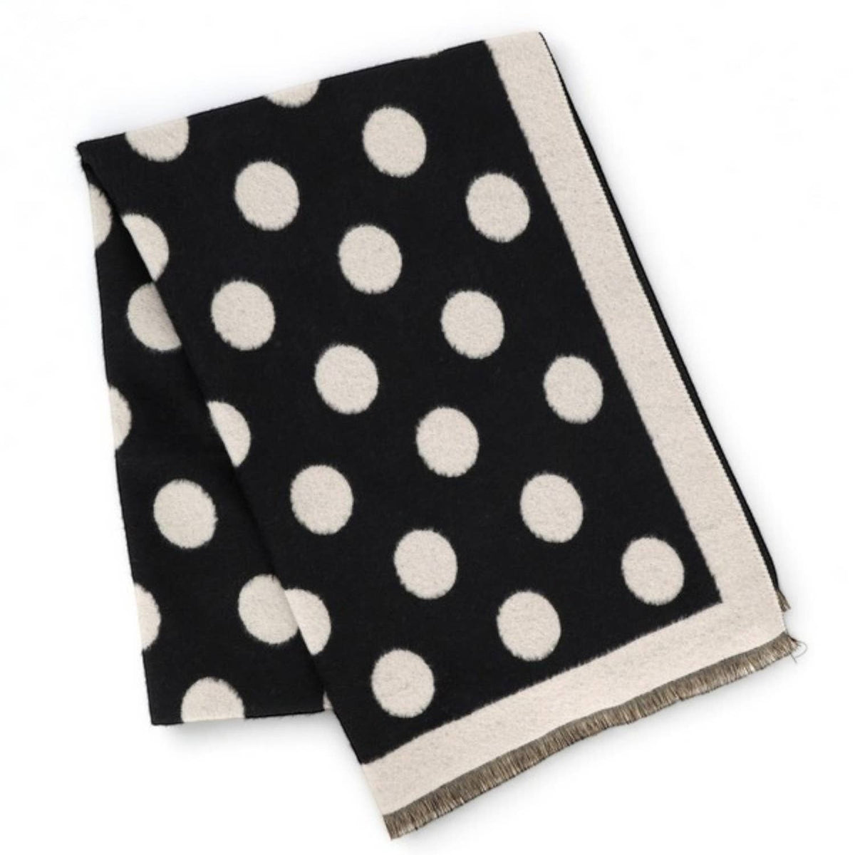 A folded black scarf with large cream polka dots and a cream border, displayed on a clean white background.