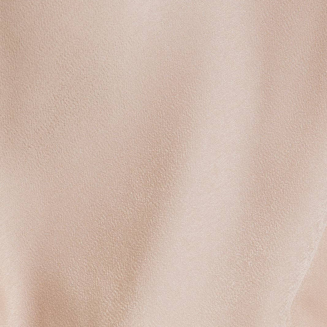 Close-up of beige fabric texture