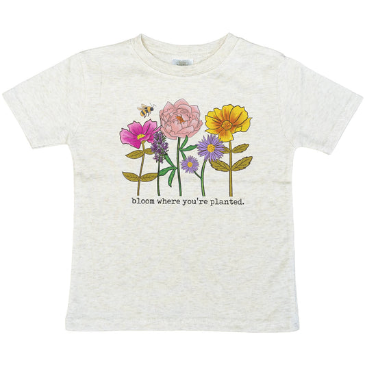 flatlay of soft cotton tee with flowers